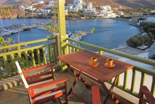 about loutra porto klaras studios with balcony view and outdoor table where you can enjoy greek coffee and admire the view of Kythnos island