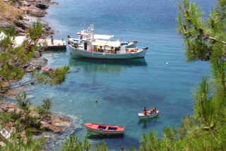 introduction porto klaras kythnos small boats in the greek sea of the cyclades